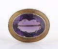 A Yellow Gold and Amethyst Brooch