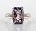 An 18 Karat White Gold Amethyst and Diamond Ring