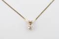A 14 Karat Yellow Gold and Diamond Pendant