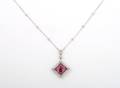 An 18 Karat White Gold Ruby and Diamond Necklace