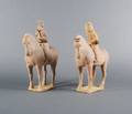 Two Chinese Painted Pottery Figures of Riders on Horses