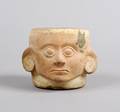 A Mayan Figural Pottery Vessel