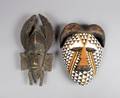 Two Carved Tribal Masks