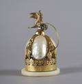 A Victorian Gilt Metal Abalone Shell and Alabaster Table Bell