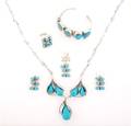 A Group of Sterling Silver and Turquoise Jewelry