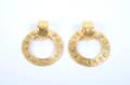 A Pair of Chanel Gold Earclips