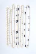A Group of Ivory Bead Necklaces