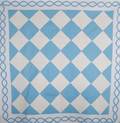 An American Trapunto Quilt