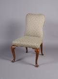 An Upholstered Arm Chair