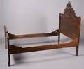 A Carved Eastlake Style Bed