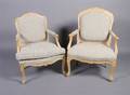 A Pair of Upholstered Arm Chairs