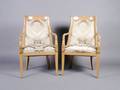 A Pair of Upholstered Louis XV Barrel Back Arm Chairs