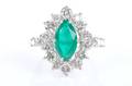 A 14 Karat White Gold Emerald Doublet and Diamond Ring