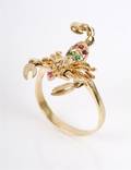 A 14 Karat Yellow Gold Ruby and Emerald Ring