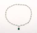 A 14 Karat White Gold Diamond and Emerald Necklace