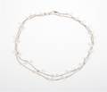 A 14 Karat White Gold and Cultured Pearl Necklace