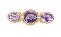 A 14 Karat Yellow Gold Amethyst and Seed Pearl Brooch