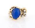 A 14 Karat Yellow Gold Lapis Lazuli and Diamond Ring