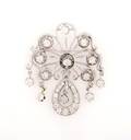 A 14 Karat White Gold and Diamond BroochPendant