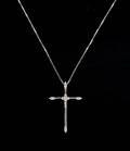 An 18 Karat White Gold and Diamond Cross Pendant