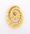 An 18 Karat Yellow Gold Brooch