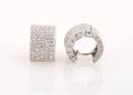 A Pair of 18 Karat White Gold and Diamond Huggie Earrings