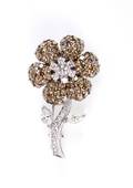 An 18 Karat White Gold and Diamond Flower Pin