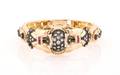 A 14 Karat Yellow Gold Diamond and Ruby Bracelet