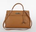 An Hermes Tan Togo Leather Kelly