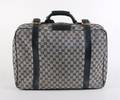 A Gucci Blue Suitcase