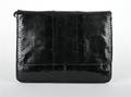 A Black Snakeskin Clutch