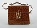 A Brown Alligator Handbag