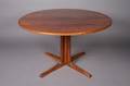 A Round Pedestal Extension Dining Table