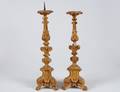 16 PAIR OF BAROQUE STYLE CARVED AND GILTWOOD PRICKET S