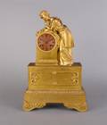 A French Figural Bronze Mantle Clock