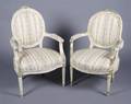A Pair of Louis XVI Style Painted Fauteuils