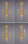 A Group of Four Italian Giltwood ThreeLight Sconces
