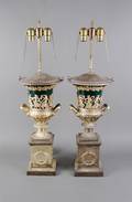 A Pair of Tole and Cast Silvered Metal Urns