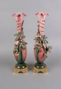 A Pair of Continental Ceramic and Gilt Metal Mounted Vases