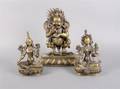 A Group of Three Tibetan Bronze Models of Buddha