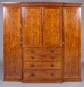 An English Mahogany Breakfront Armoire