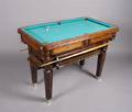 A Miniature Mahogany Pool Table