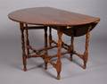 A Walnut Gateleg Drop Leaf Table