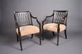 A Pair of Regency Style Open Arm Chairs