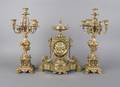 A French GiltMetal Clock Garniture Set