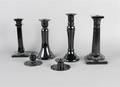 An Assembled Group of Glass Candlesticks