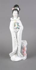 A Chinese Porcelain Figure of a Lady