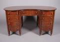 A Reniform Mahogany Desk