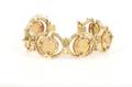 An 18 Karat Yellow Gold and Gold Coin Bracelet