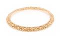 An 18 Karat Yellow Gold and Diamond Necklace Trika Necklace by Bulgari